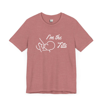 Mauve colored breastfeeding t-shirt that says I'm the tits in white print with a minimalist drawing of a baby nursing from a breast.