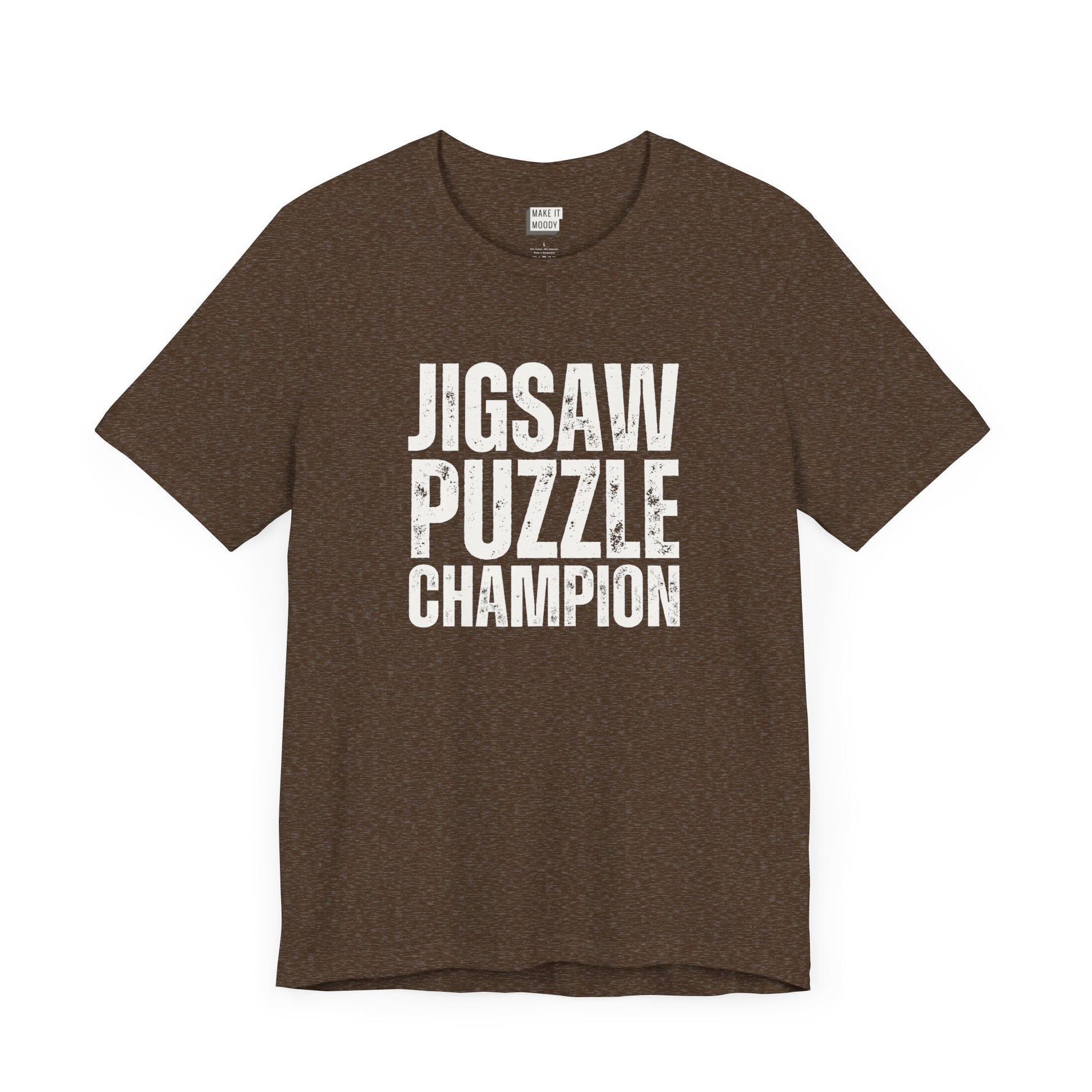 funny graphic t shirt in brown that says JIGSAW PUZZLE CHAMPION in bold white lettering