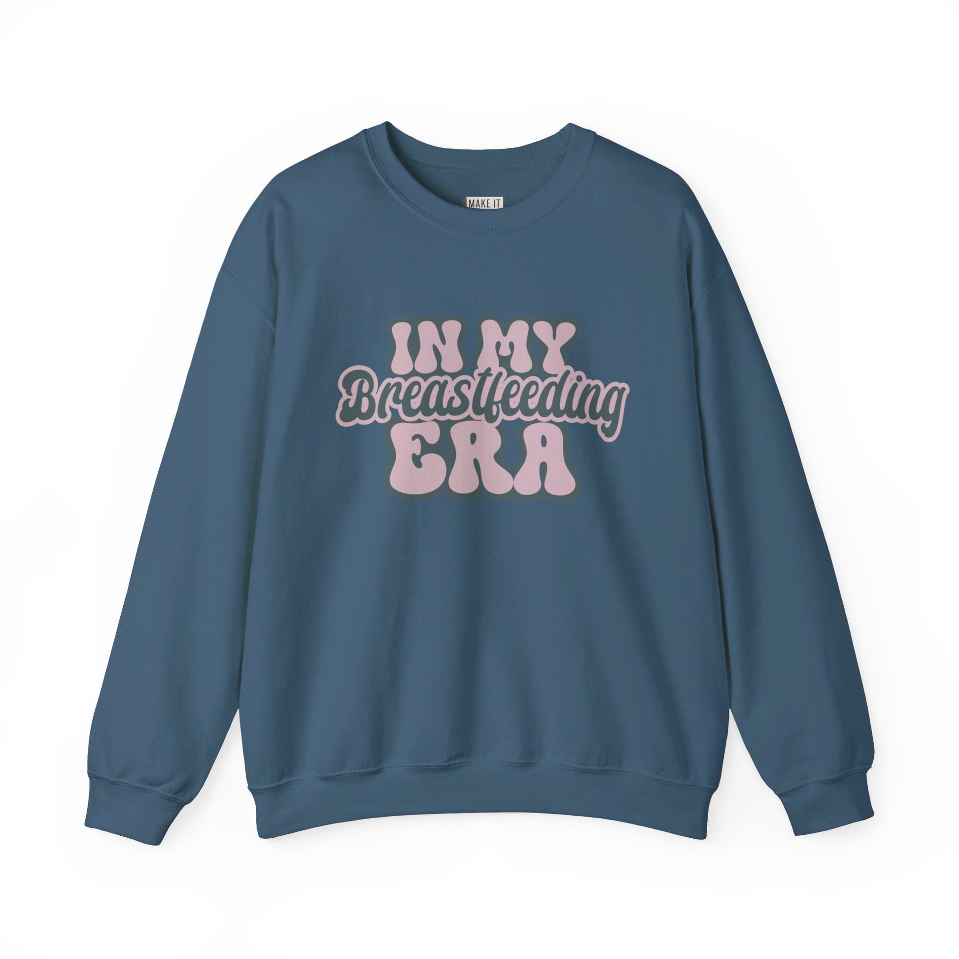 Denim blue breastfeeding sweatshirt that says IN MY BREASTFEEDING ERA in pink and blue retro lettering.