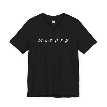 Mom t-shirt in black with MOTHER displayed in bold white letters, accented by colored dots between each letter. The design is reminiscent of the logo from the tv show called Friends.