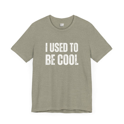 funny t shirt in stone that says I USED TO BE COOL in bold white lettering