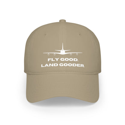 Khaki baseball cap with a white airplane image and the text "FLY GOOD. LAND GOODER." printed below it in white, named "Fly Good Land Gooder" Aviation Hat.