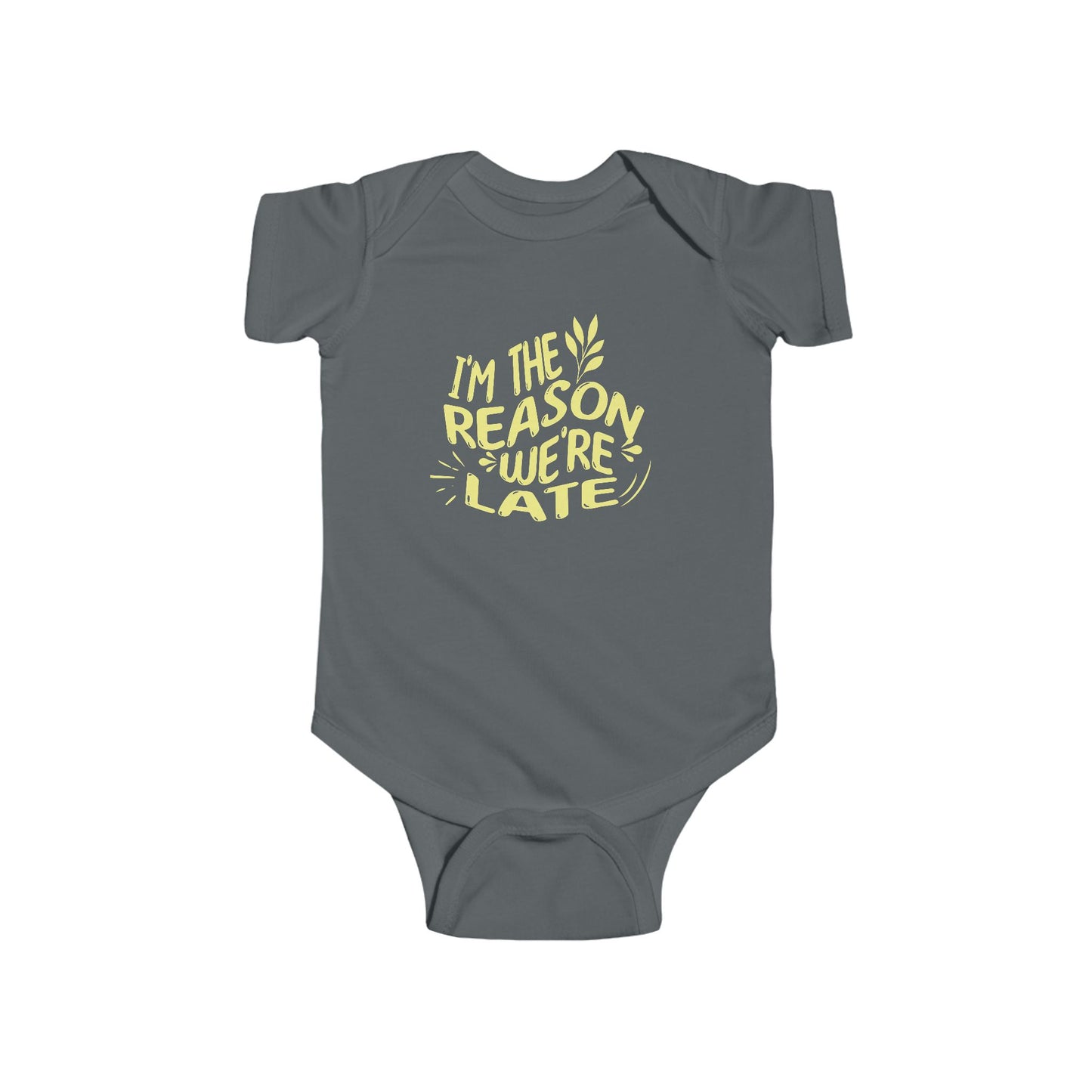 charcoal grey infant bodysuit that says I'M THE REASON WE'RE LATE in yellow wavy lettering on the front.