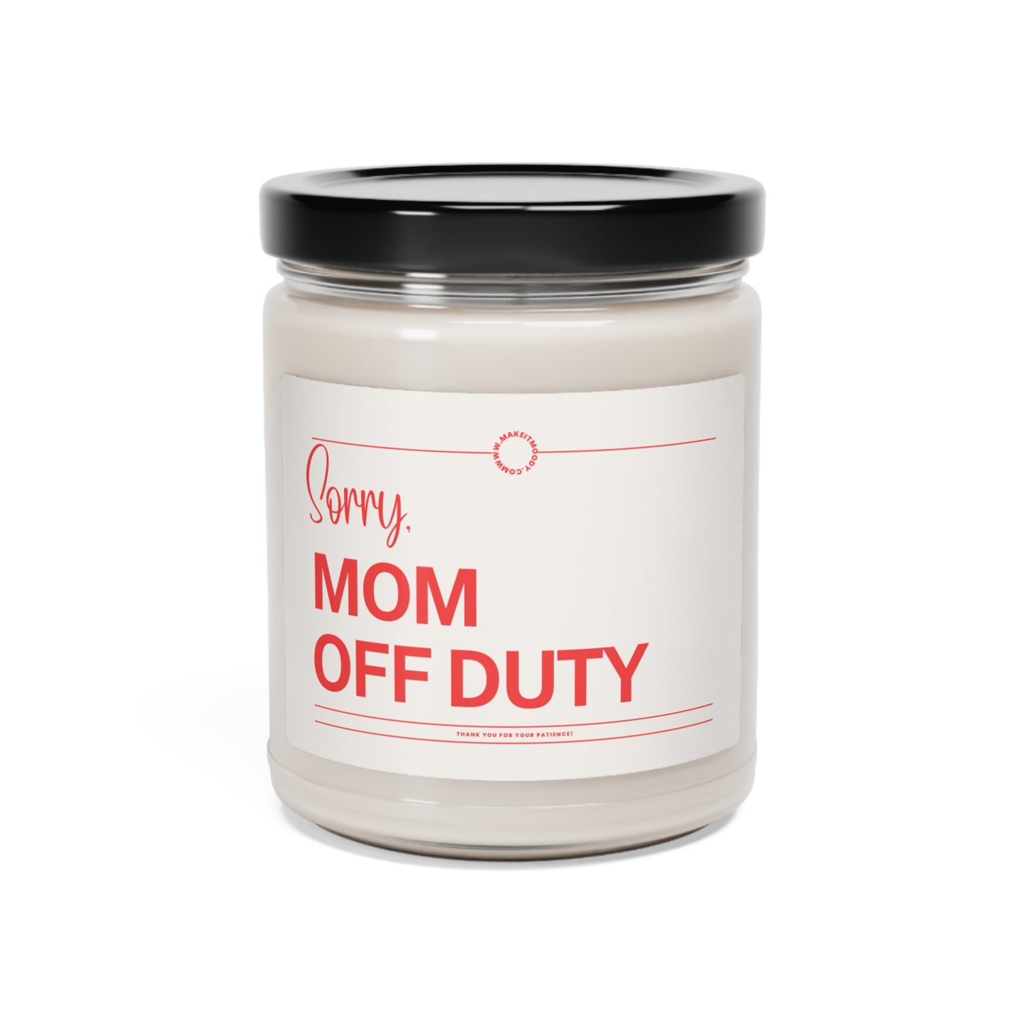 White candle in a glass jar with a black lid. The red text on the label reads "Sorry, MOM OFF DUTY.