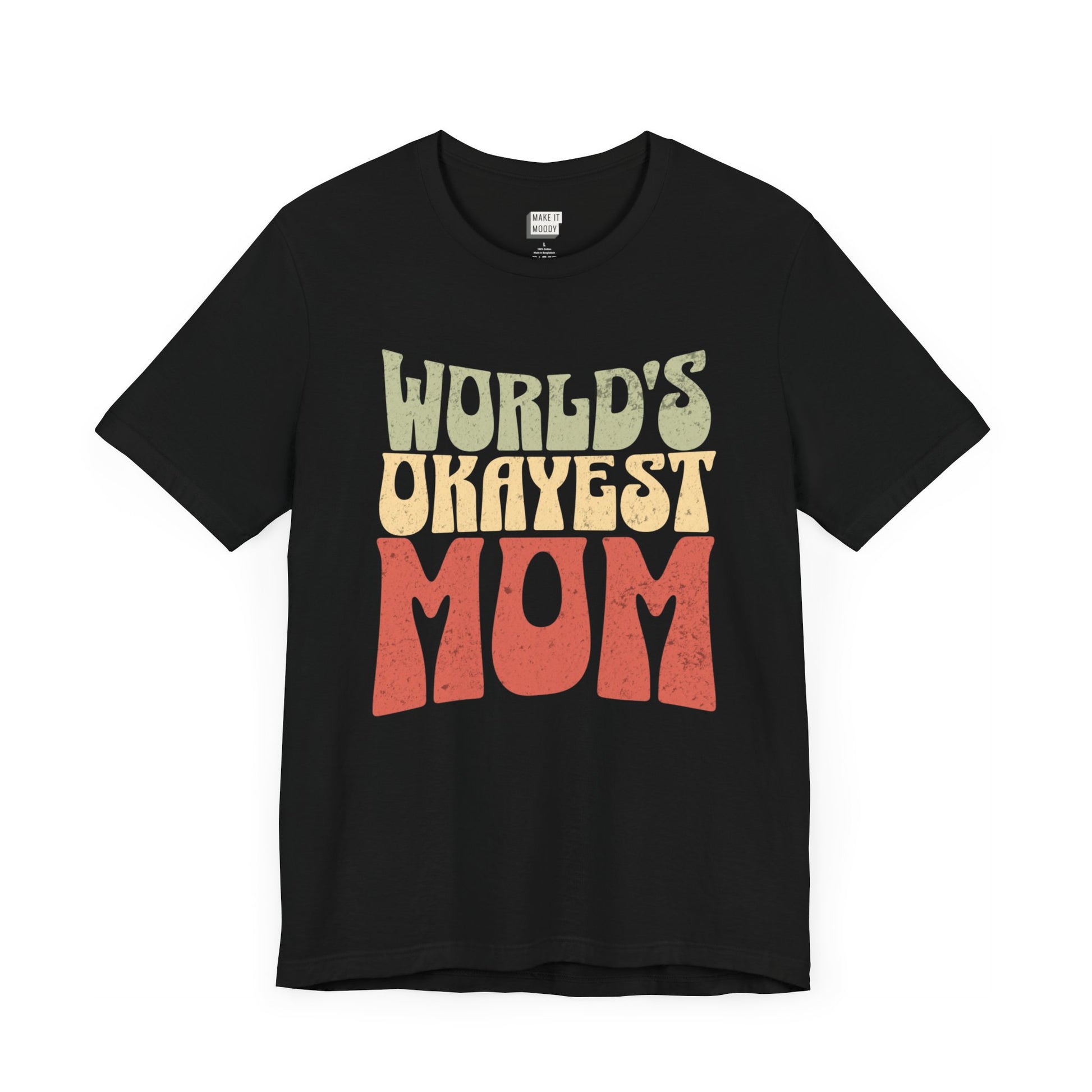 Black mom t-shirt with the text WORLD'S OKAYEST MOM in large retro-style yellow and orange letters on the front.