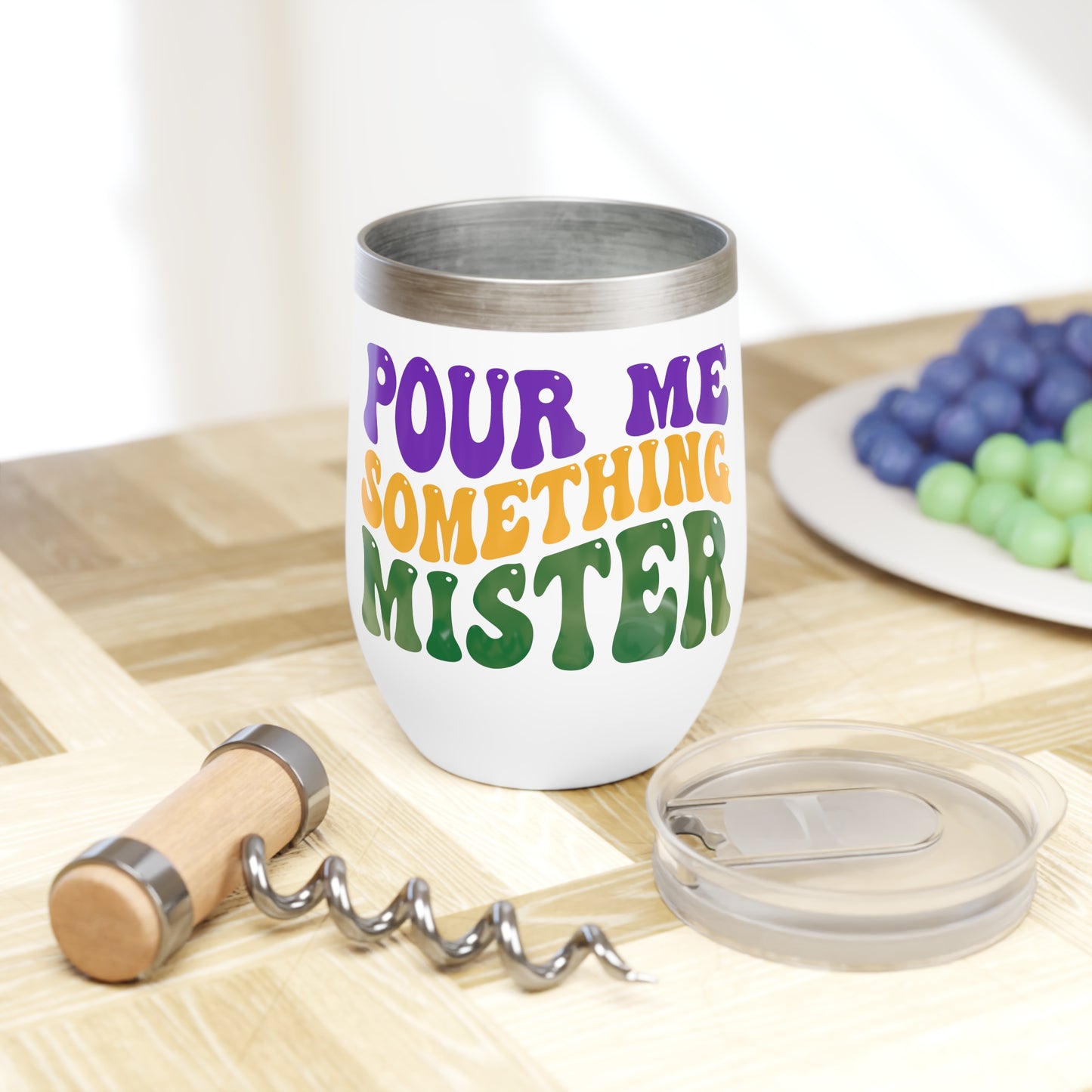 mardi gras wine tumbler that says "pour me something mister"