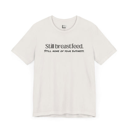 Vintage white breastfeeding t-shirt that says Still Breastfeed Still None Of Your Business.
