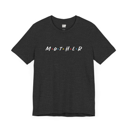 Mom t-shirt in dark heather grey with MOTHER displayed in bold white letters, accented by colored dots between each letter. The design is reminiscent of the logo from the tv show called Friends.