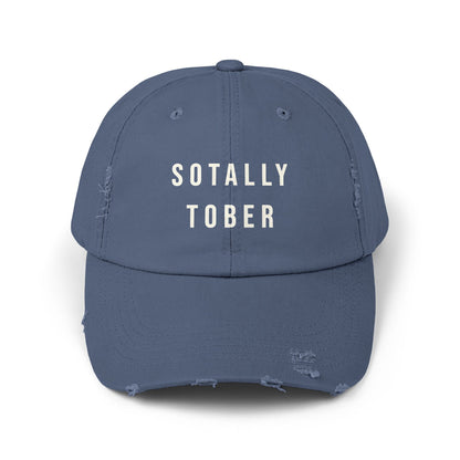 Blue baseball cap that says SOTALLY TOBER in bold letters on the front.