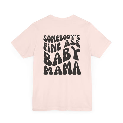 Soft pink mom t-shirt featuring the text SOMEBODY'S FINE ASS BABY MAMA in bold, black, wavy letters on the back.