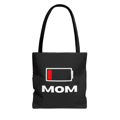 A black tote bag named "Mom Battery Low - Mom Tote Bag" featuring "MOM" and a nearly empty battery icon printed on it.