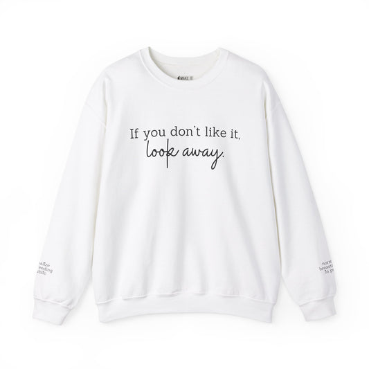 White breastfeeding sweatshirt with IF YOU DON'T LIKE IT, LOOK AWAY printed on front and normalize breastfeeding in public printed on sleeves by the wrist.