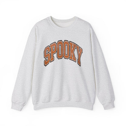 White colored Halloween crewneck sweatshirt featuring the word SPOOKY in arched, bold orange and black letters on the front.