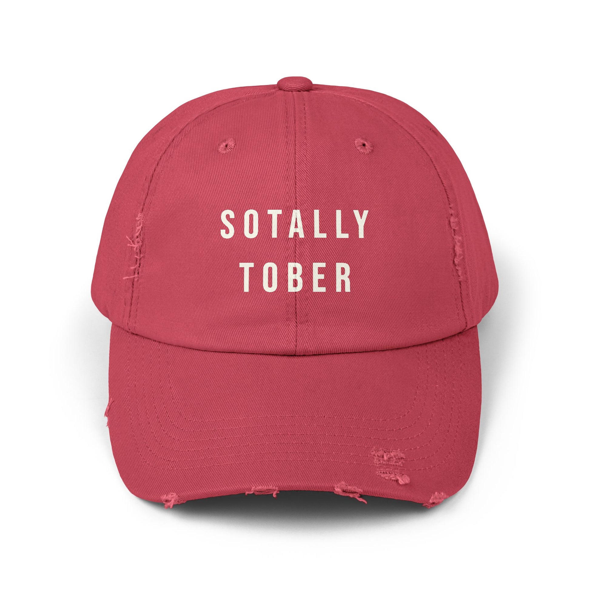 Red baseball cap that says SOTALLY TOBER in bold letters on the front.