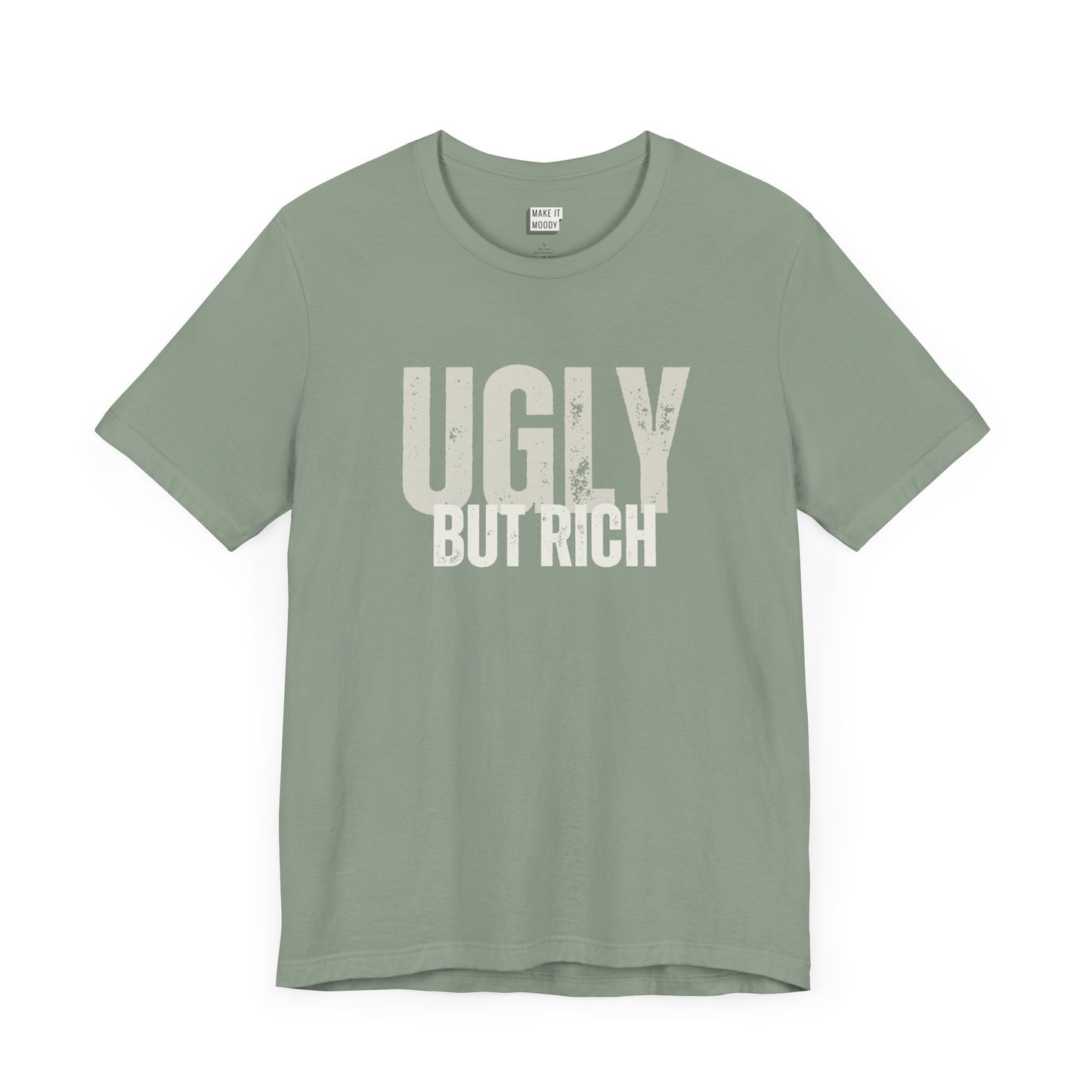 funny t shirt in sage green that says UGLY BUT RICH in bold white lettering