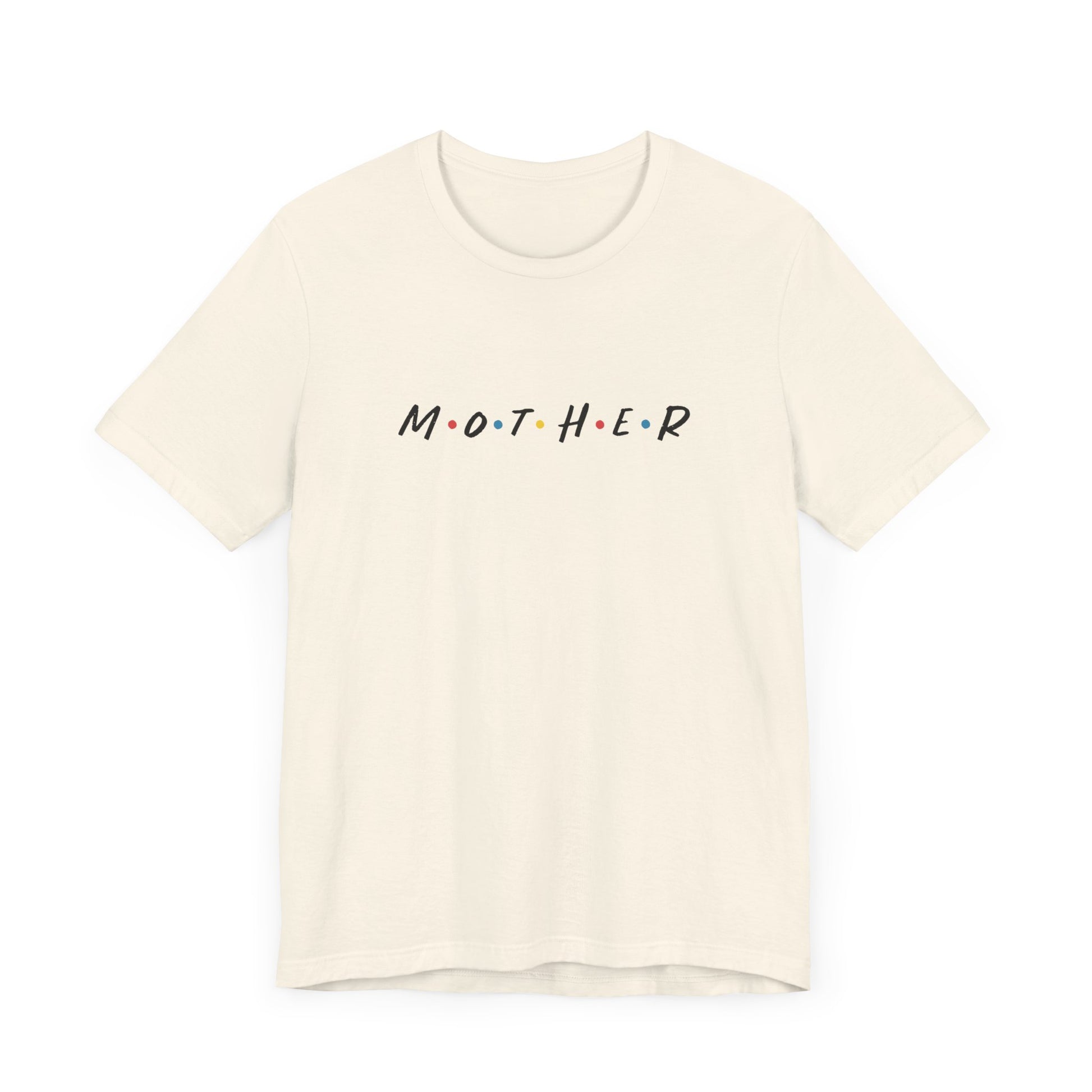 Mom t-shirt in off-white with MOTHER displayed in bold black letters, accented by colored dots between each letter. The design is reminiscent of the logo from the tv show called Friends.