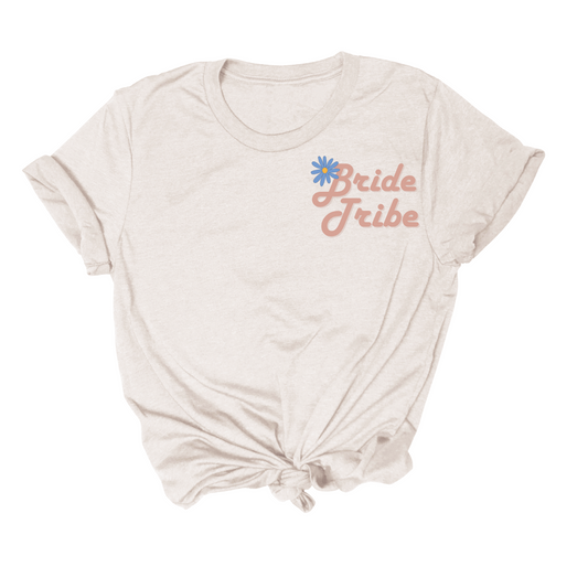 cute t shirt that says bride tribe on the front and here comes the bride on the back in a retro font