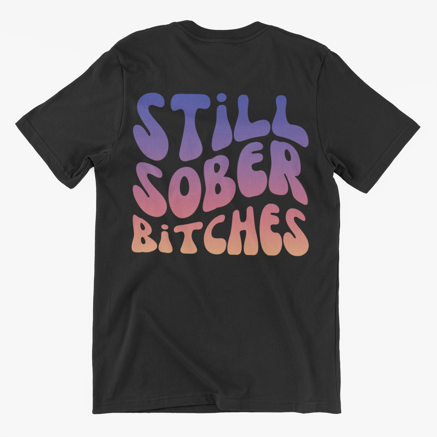 Black "Still Sober Bitches Tee" featuring a gradient purple-to-pink groovy font print on the back.